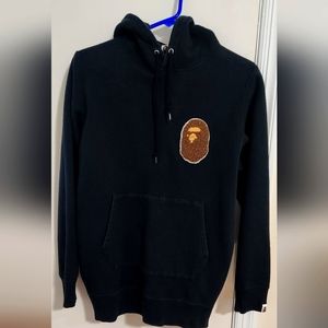 A Bathing Ape hoodie with zippers on both sides.  Size M.